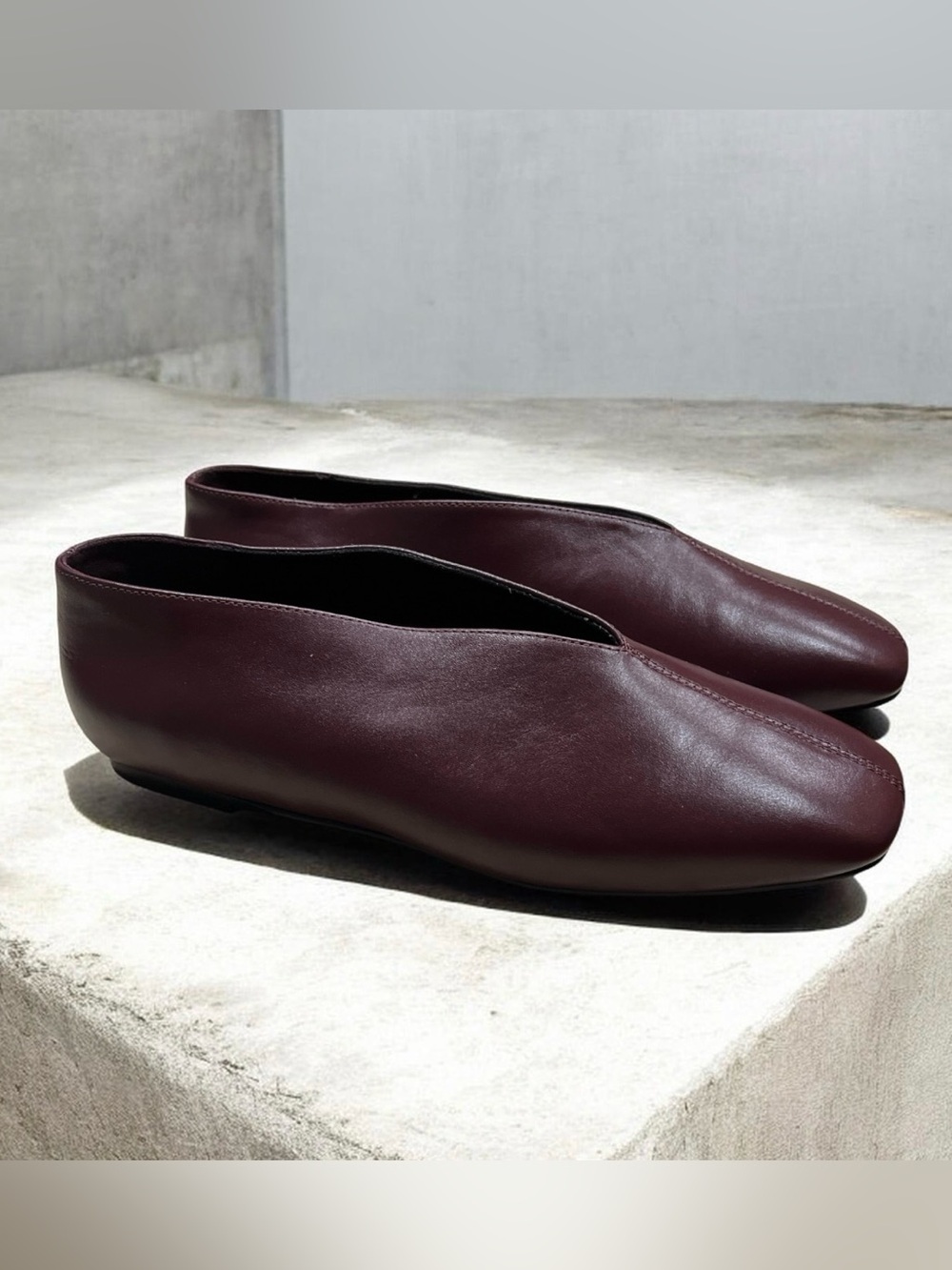 Black Suede Studio Lue Choked Up Ballerina Flat in burgundy leather. Women’s